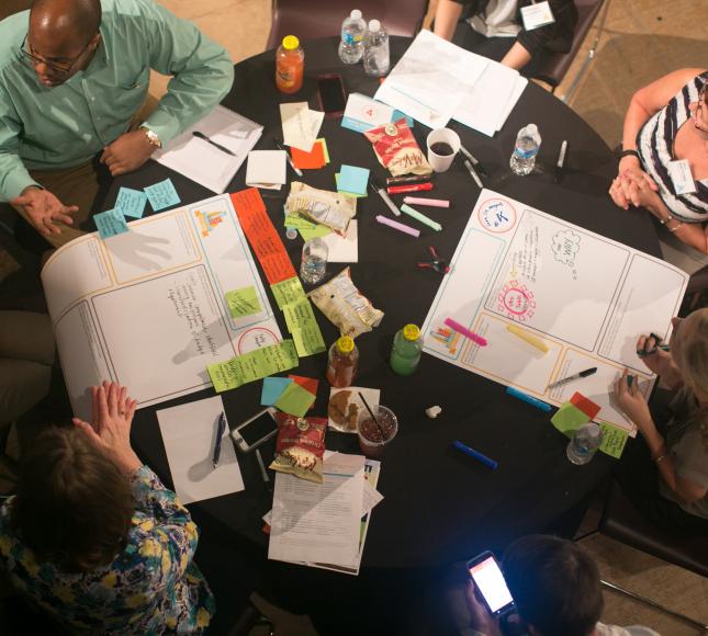 Photo of a group of people conducting a meeting