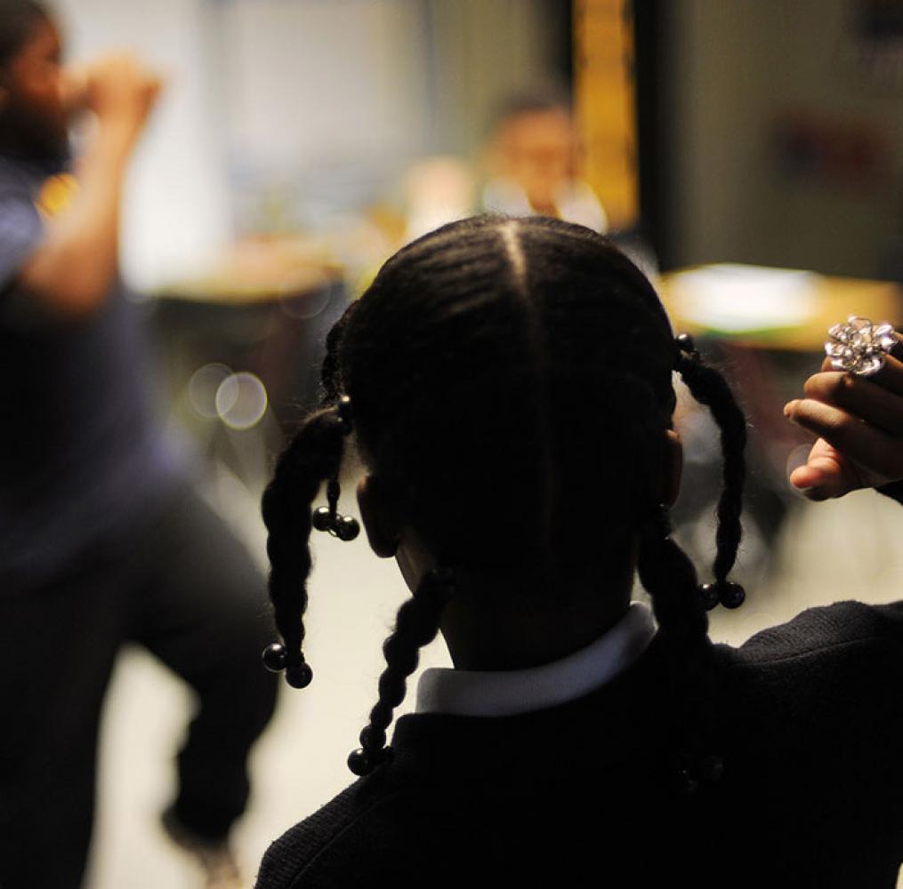 Fifth and sixth grade students warm up for class at a private K-12 school in Washington, D.C., October 2012