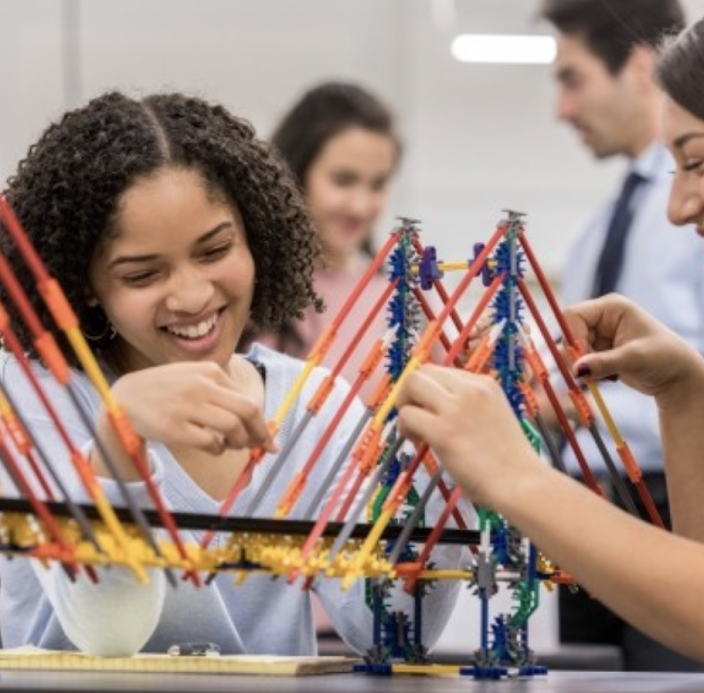 Two students working on a science project.