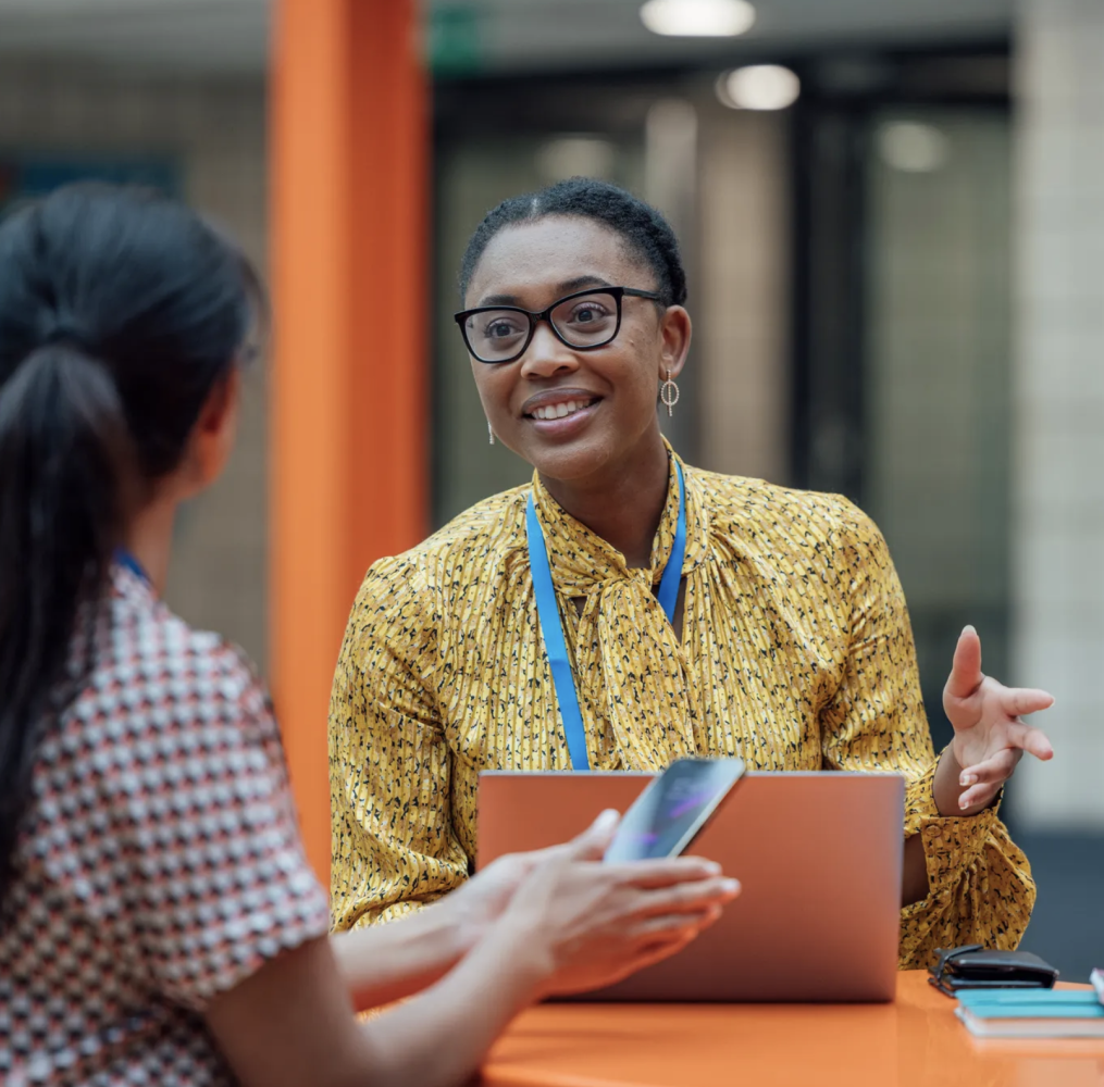 Two educators having a discussion.