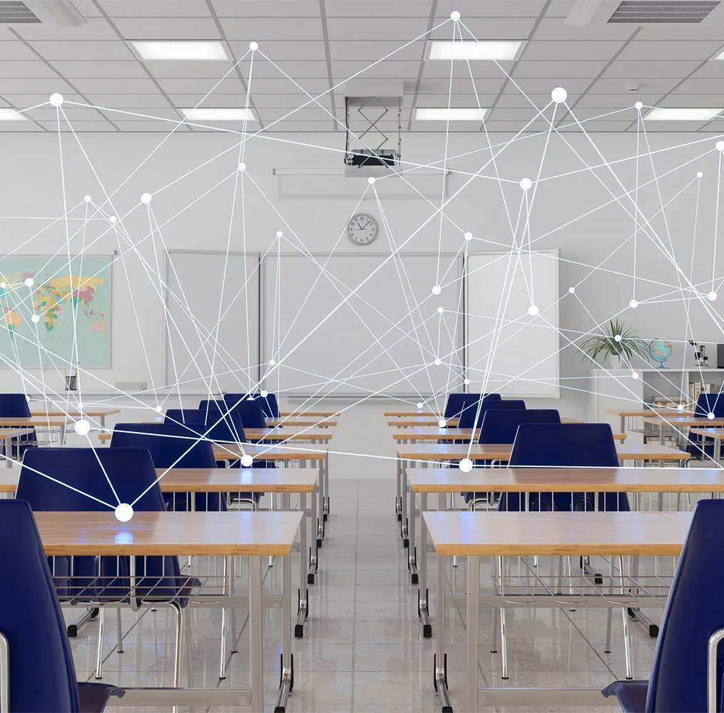 An empty classroom with a technical map overlay.