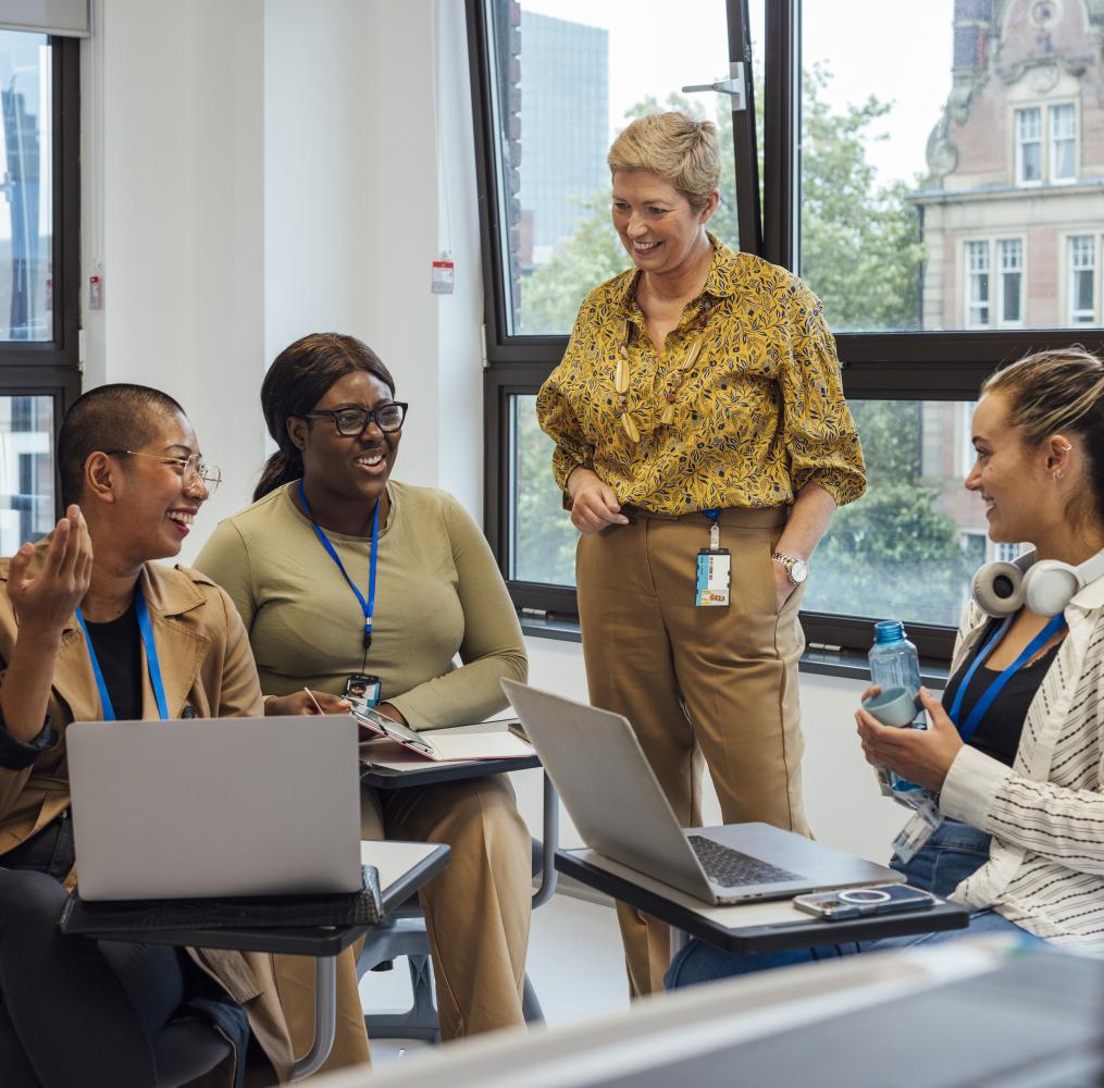 Group of adults in a classroom.