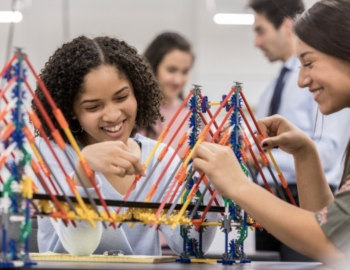 Two students working on a science project.